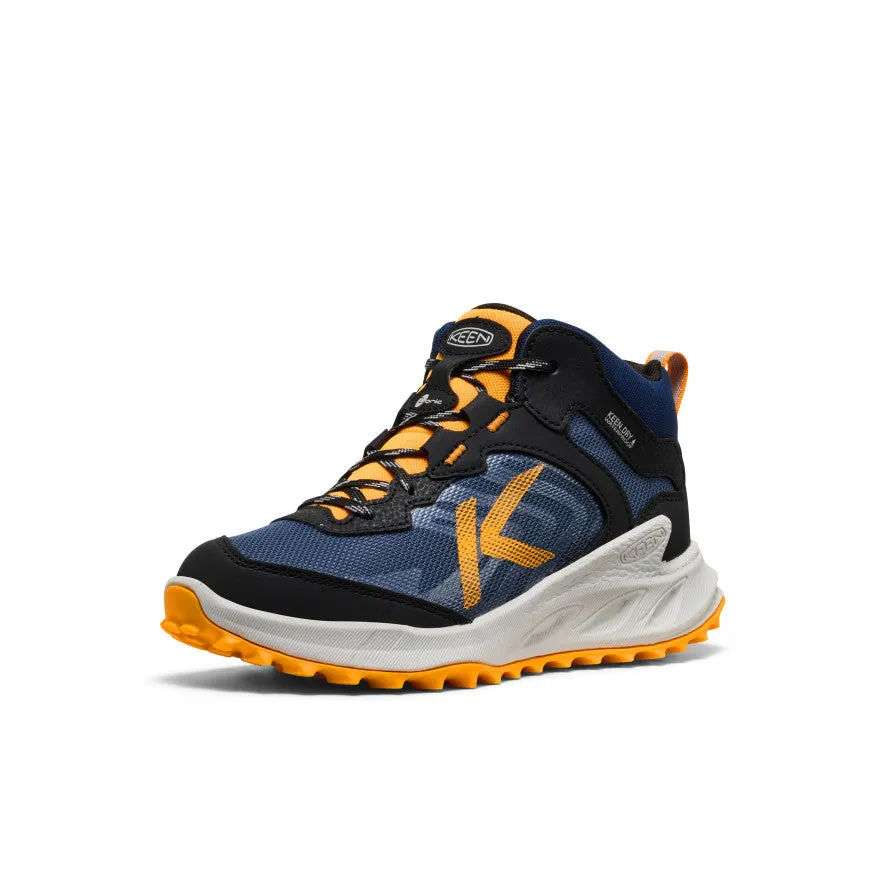 Adjustable Laces stay secure through repeated motion and impact Big Kids' Zionic Waterproof Boot  |  Naval Academy/Bright Marigold