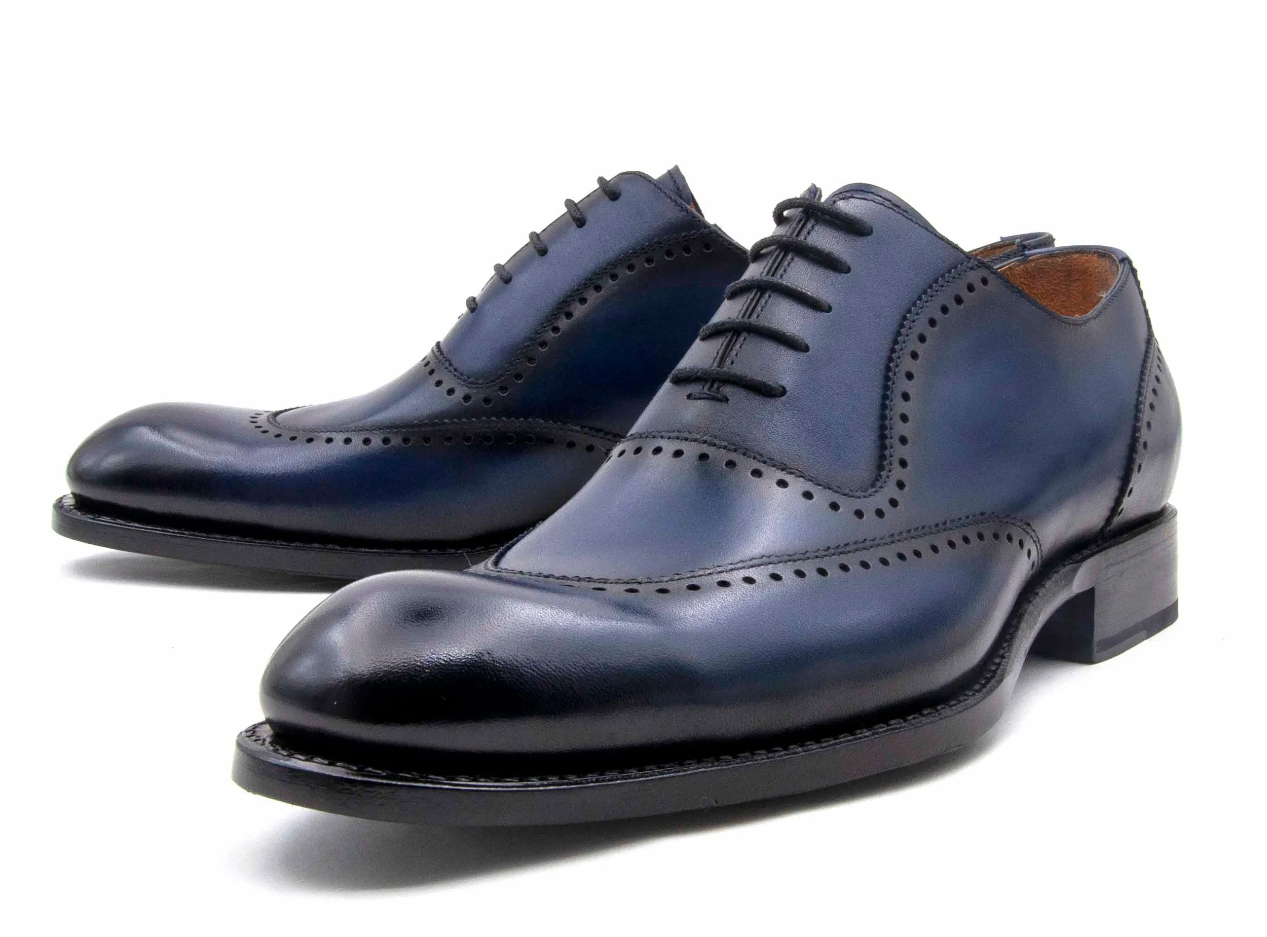 Style: Charlton-Navy Antique Glow Desert Path