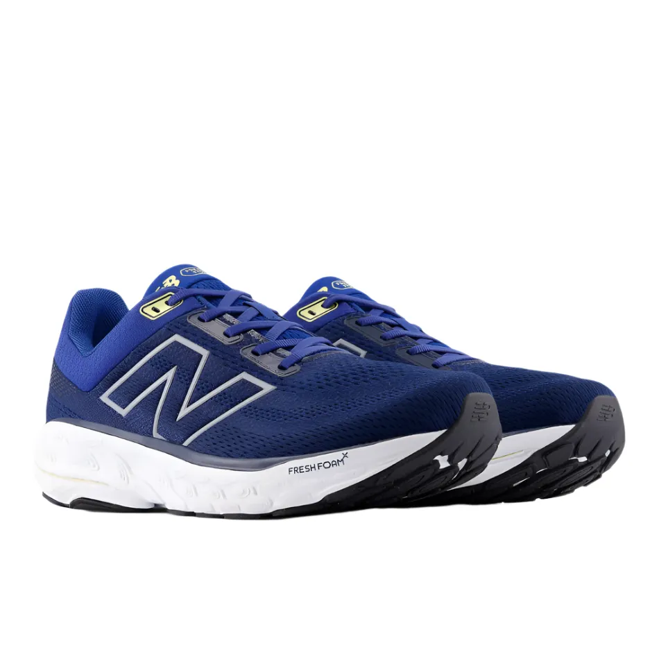 New Balance Men's 860 V14 Running Shoes in Galaxy Blue/NB Navy/Winter Grass AW25 competitive shoes running in a tram station area shoes
