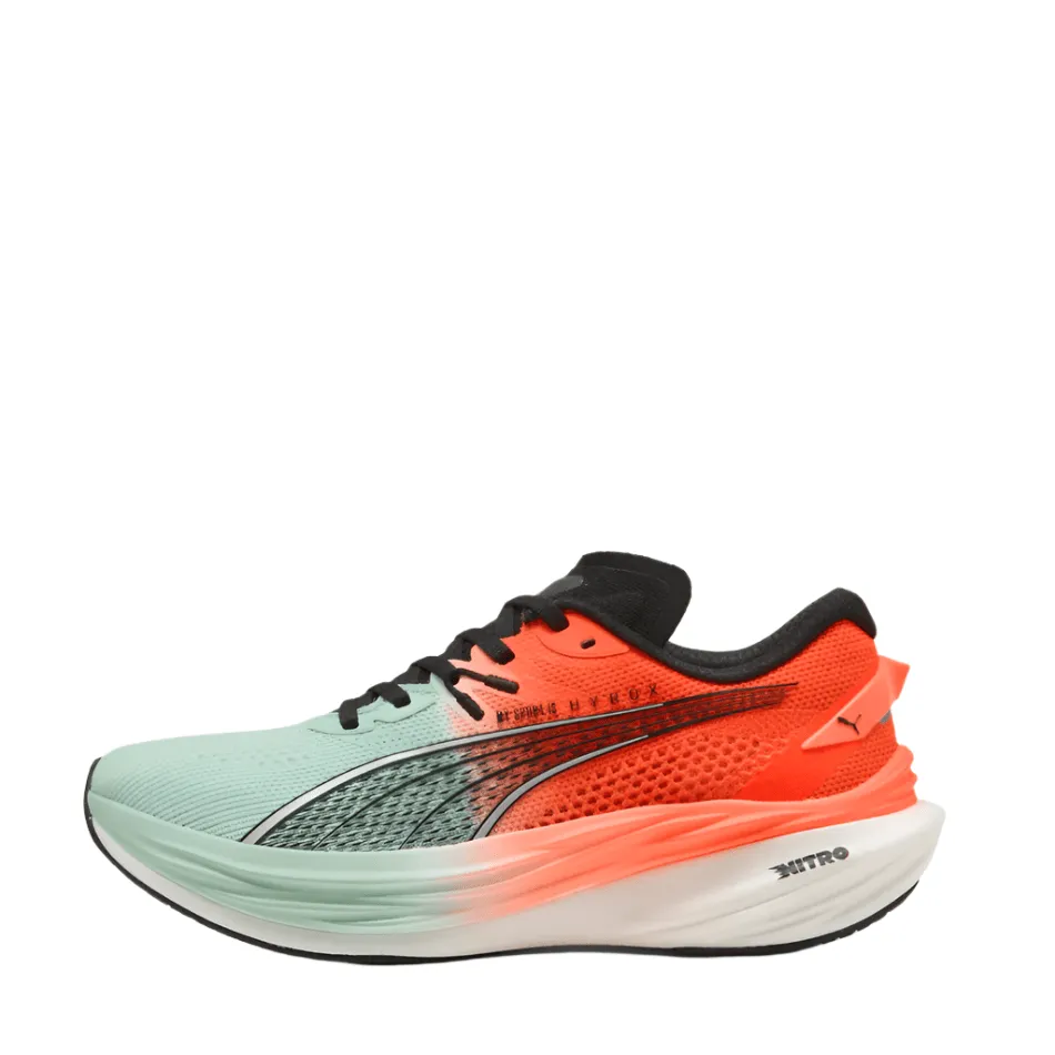 PUMA Women's Deviate NITRO 3 Hyrox Running Shoes in Mint Melt/Glowing Red AW25 running with a phone