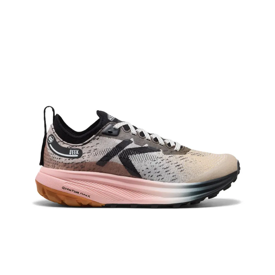 Women's Seek Trail Running Shoe  |  Black/Sunset Sand Running Path